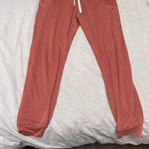 Vuori Coral/Orange Relaxed Fit Sweatpants with Tapered Ankles
